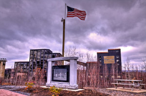 Looming storm over the memorial, forecasting the fate of the structure behind it.